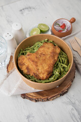 Green sauce pesto pasta Food buffet peruvian table Assorted dishes gourmet cuisine Peru traditional 