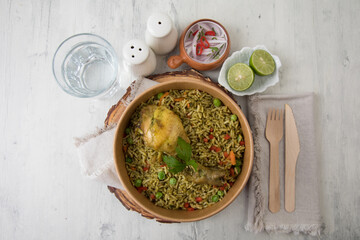 Arroz con pollo green rice Food buffet peruvian table Assorted dishes gourmet cuisine Peru traditional 