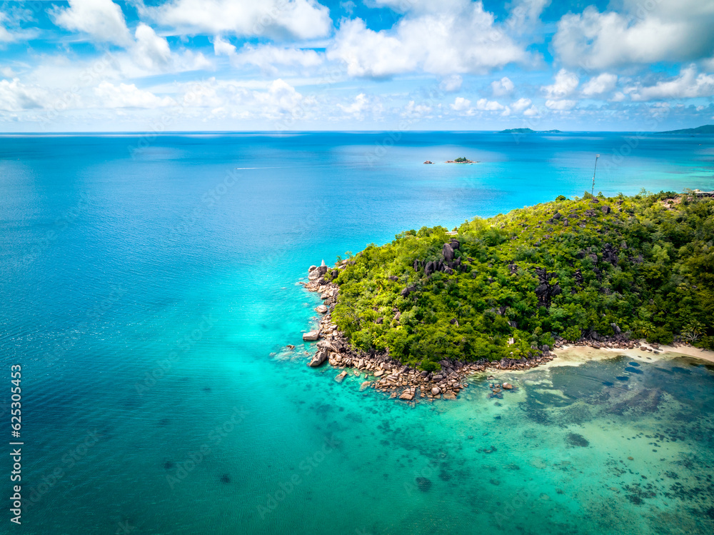 Wall mural praslin seychelles tropical island with withe beaches and palm trees. aerial view of tropical paradi