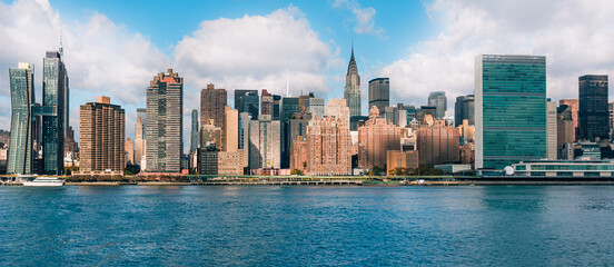 east Manhattan New York city skyline on a sunny day