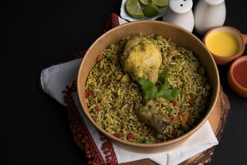Arroz con pollo green rice with chicken Food buffet peruvian table Assorted dishes gourmet cuisine Peru traditional 