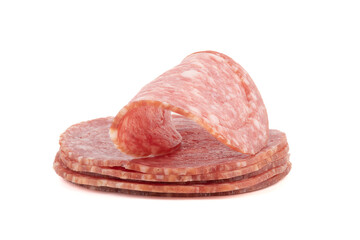 Delicious raw smoked sausage in slices isolated on white background.