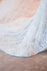 Fototapeta na wymiar Wedding dress veil on the floor.