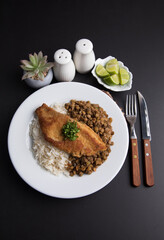 Fried fish fillet with lentils stew Food buffet peruvian table Assorted dishes gourmet cuisine Peru traditional 