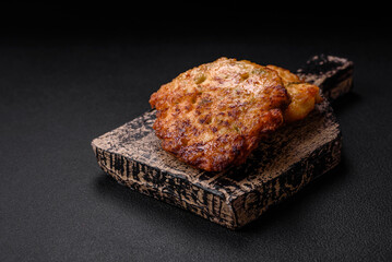 Delicious fresh fried minced chicken meat cutlets with salt, spices and herbs