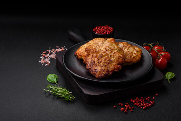 Delicious fresh fried minced chicken meat cutlets with salt, spices and herbs