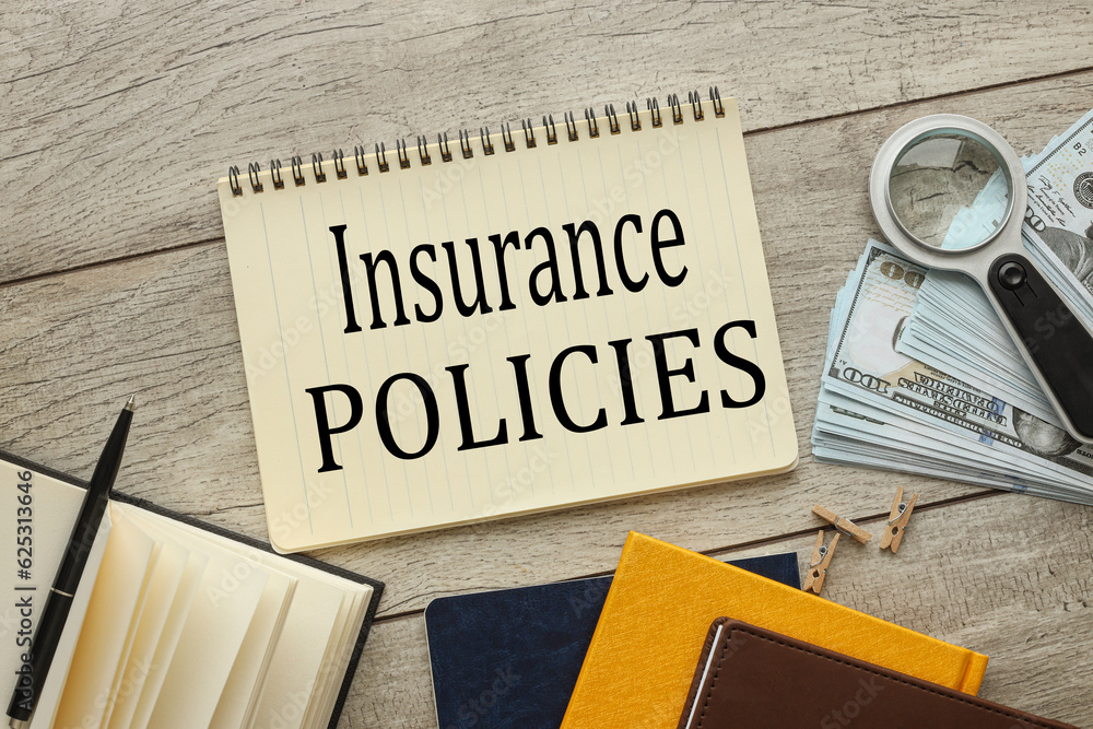 Poster insurance policy yellow notepad and text on notebook page
