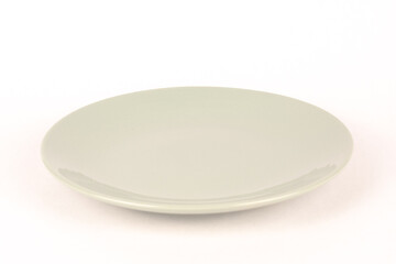 Empty gray green glass plate white background