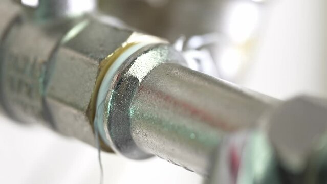 Threaded connection of plumbing pipes with FUM tape sealing