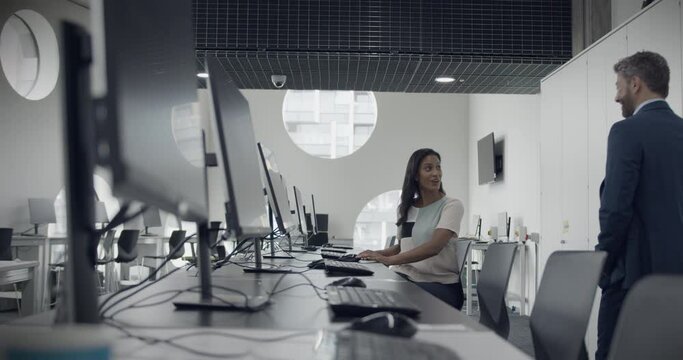 Business People Meeting in Office and Shaking hands and looking at Computer screen