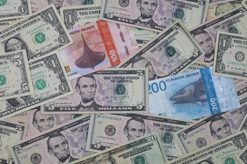 Fototapeta na wymiar economy and exchange rate with norwegian and american money