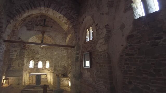 Cape of Rodon, Albania - June 1, 2023: interior of St. Anthony Church is a small, whitewashed building with a single nave. It is adorned with frescoes that beautifully portray life of Saint Anthony