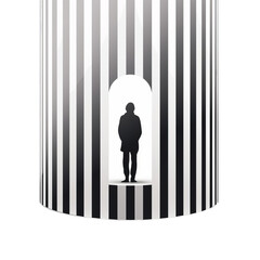 a man standing in front of a black and white striped wall