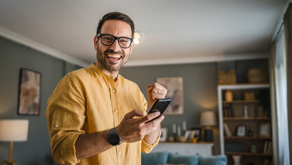 Obraz na płótnie Canvas One adult man with eyeglasses stand at home happy smile