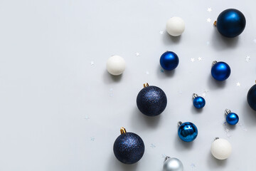 Different Christmas balls on white background