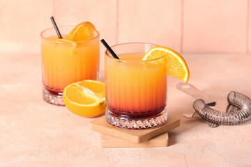 Glasses of tasty mai tai cocktail on table