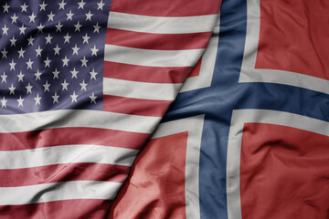 big waving colorful flag of united states of america and national flag of norway . © luzitanija