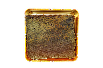 honeycomb in the package removed from the beehive - obrazy, fototapety, plakaty
