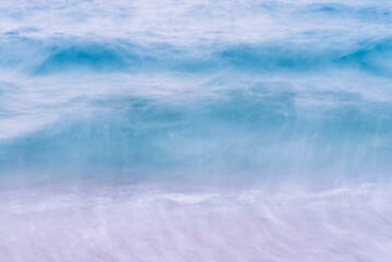 A seascape abstract wave background, panning motion blur with a long exposure, pastel colors in a vintage and retro style.