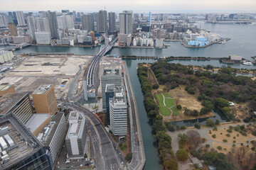 Tsukiji and Hamarikyu from the observation area on the 46th floor of Caretta Shiodome in Shiodome, Tokyo, Japan. January 19, 2023