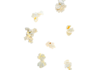 Fototapeta premium Popcorn kernels flying in air, snack food and entertainment concept