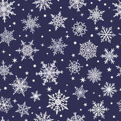 Christmas seamless pattern of beautiful complex snowflakes in dark blue and white colors. Winter background with falling snow