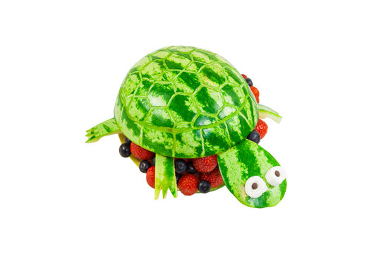 Turtle carved from a watermelon isolated on transparent or white background. Concept for kids to set for healthy eating. Suitable for children's birthday parties.