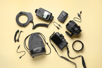 Composition with modern photo equipment on color background