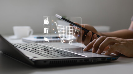 online shopping concept. businessmen use laptops, smartphones and credit cards to purchase products from online stores and shop on the Internet, e-commerce stores. concept on a virtual screen.