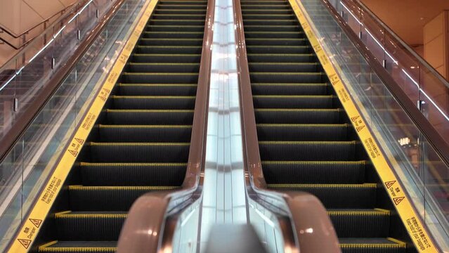 Tokyo, Japan - July 15, 2023: Unmanned or peopleless or unattended escalator
