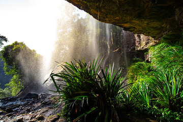 mysterious cave and trail behind the waterfall, beautiful view from behind the waterfall, Warrie...