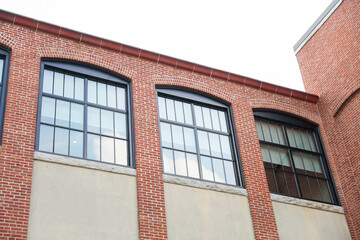 brick building business complex represents solid foundations and success in commerce. Impressive architecture capturing ambition and stability in modern century entrepreneurship