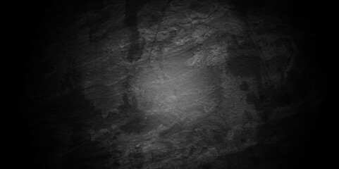 Black stone wall texture grunge rock surface. dark gray background backdrop. wide panoramic banner. old wall stone for dark black distressed grunge background wallpaper rough concrete wall.