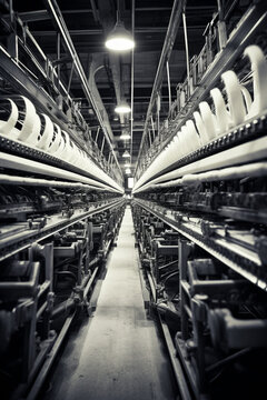 Modern textile factory with automated looms weaving patterns