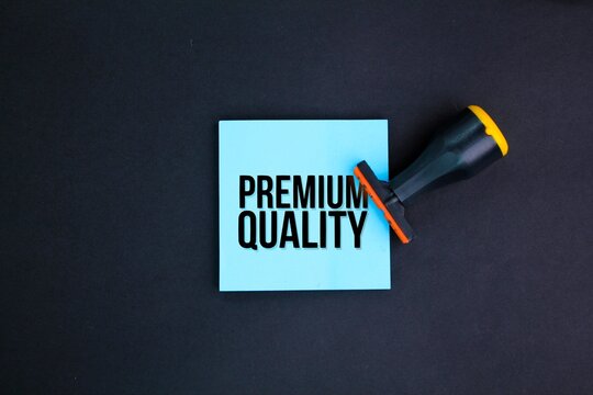 stamp and paper with the word PREMIUM QUALITY. quality or premium concept