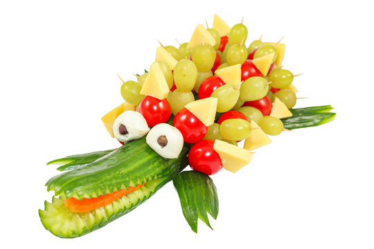Cucumber crocodile - Crocodile carved out of a cucumber isolated on transparent or white background. Concept for kids to set for healthy eating. Suitable for children's birthday parties.
