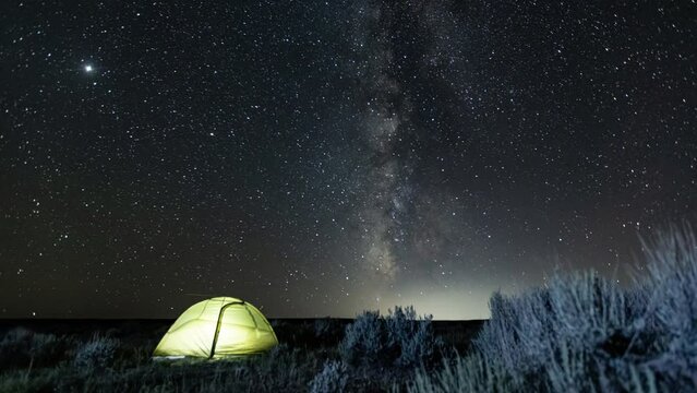 A generic astrolapse photography timelapse of tent camping while viewing the Milky Way from the Black Canyon of the Gunnison in Colorado