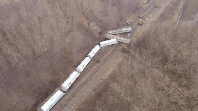 People working on train derailment in Michigan, aerial drone view