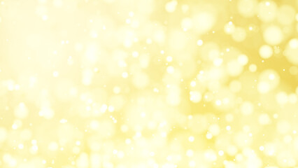 キラキラと光る金色の光。玉ボケ。（横長）