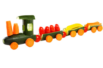 From cucumbers and other vegetables carved train isolated on transparent or white background....