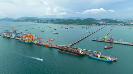 small distribution port in sea and pedestrian bridge to conect between islands and oil tankers ship...