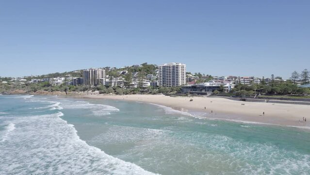 Sandy Coastal Paradise At The Coolum Beach In Summer In Queensland, Australia. aerial sideways