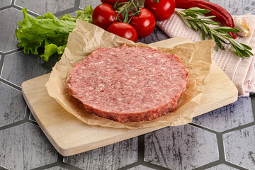 Raw beef uncooked burger cutlet