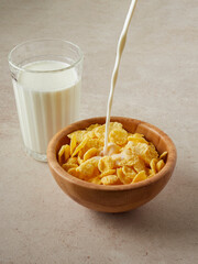 Healthy cornflakes with milk for breakfast           