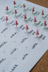 4 day work week printed calendar with pink pins on three days off in week weekend days four day...