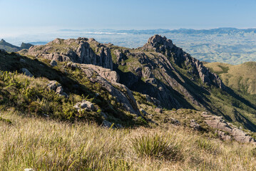 Beautiful view to rocky mountain and altitude fields landscape