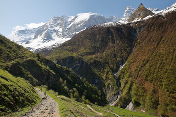 Fototapeta na wymiar A hiking trail leading to the Gliere Hut at the end of the valley of Champagny le Haut, Vanoise National Park, Northern French Alps, Tarentaise, Savoie, France, with the glacier Grande Motte 