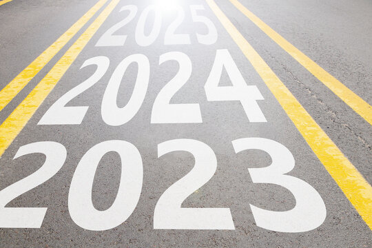 2023 and 2024 and 2025 written on the asphalt road going forward in Ukraine, the beginning of the new year and the way forward