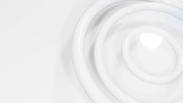 Animation of white spinning circles in seamless loop