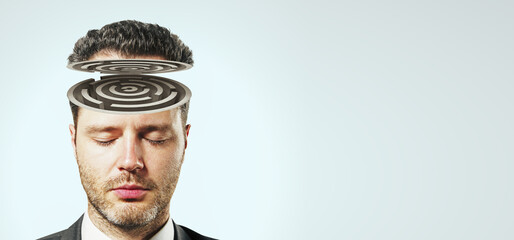 Maze of reason and psychology concept with man head with labyrinth on light grey background - obrazy, fototapety, plakaty